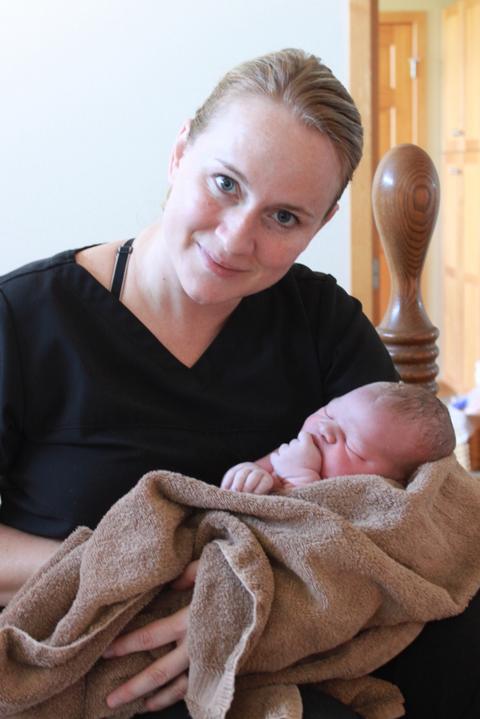 Kristin holding newborn baby